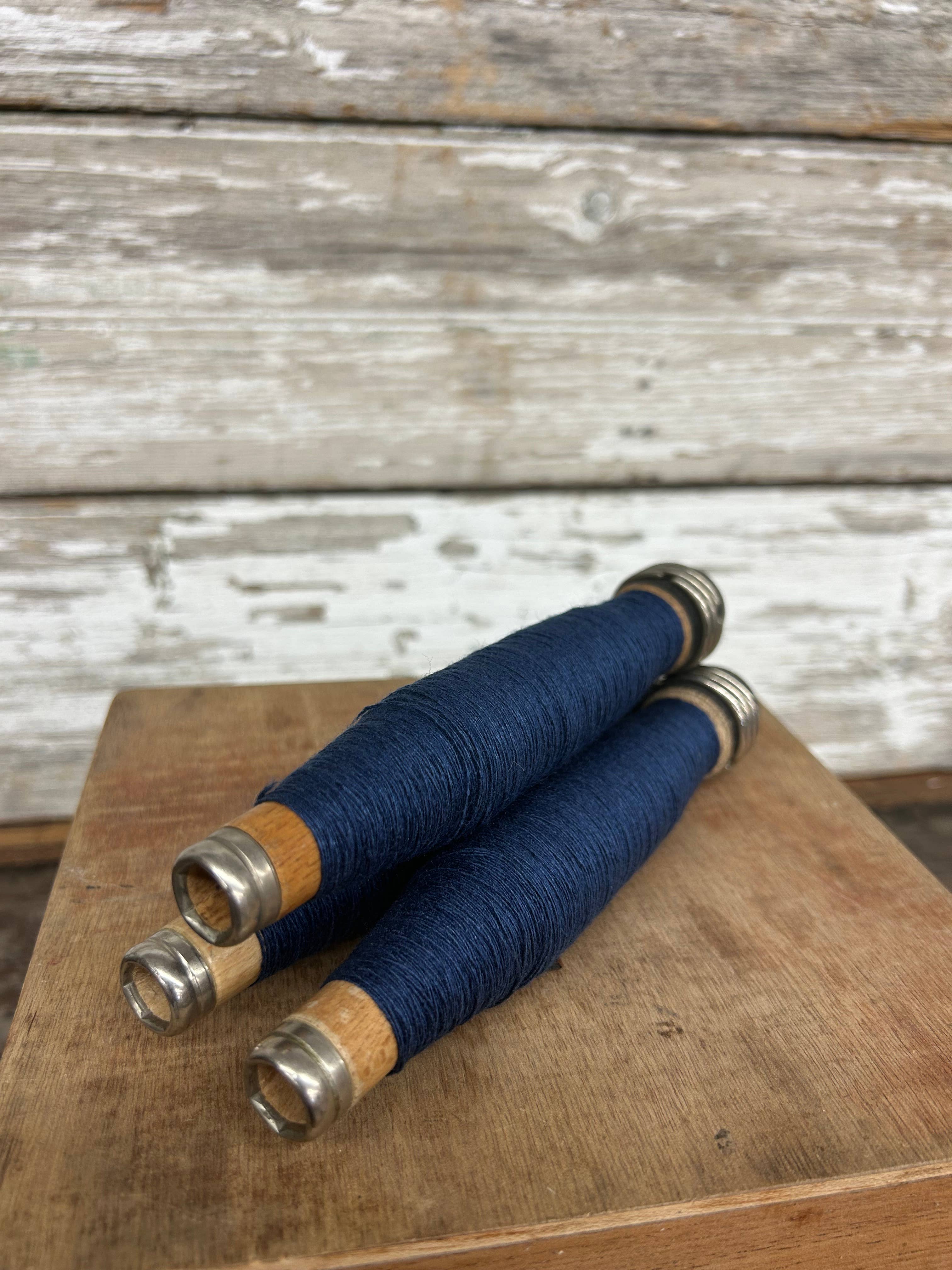 7001. Dark Blue Yarn Quill