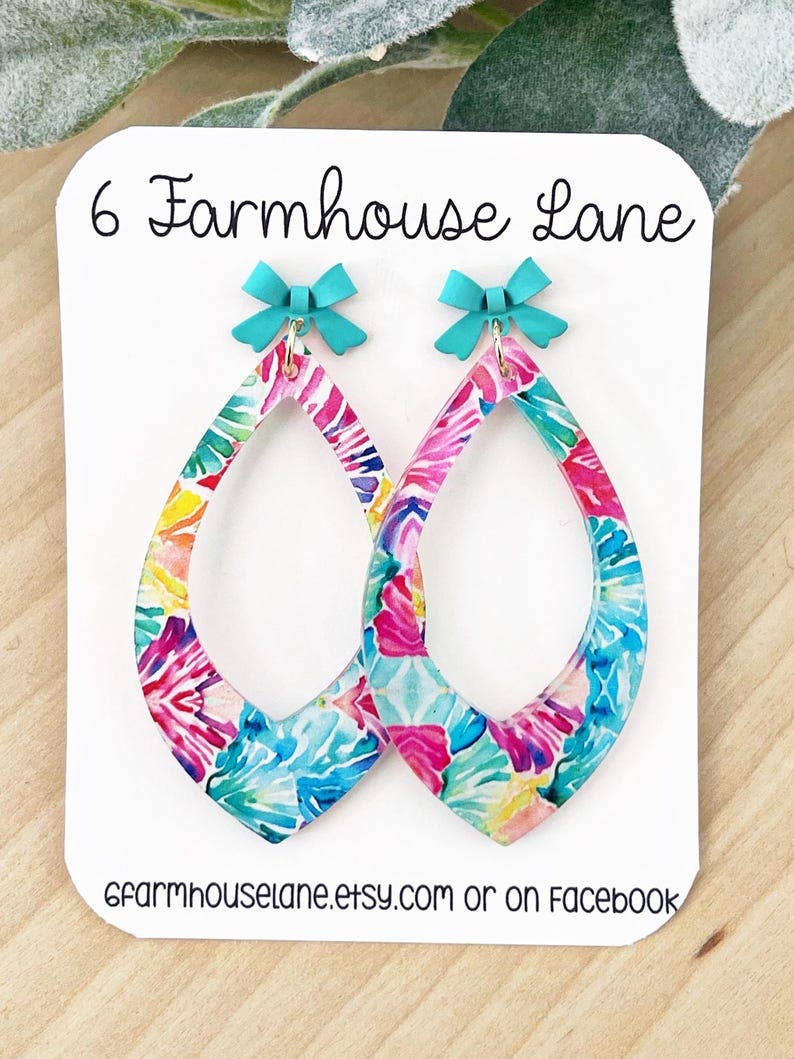 4183. Tropical Teardrop Dangle Earrings: Acrylic tropical Print with Teal Bow