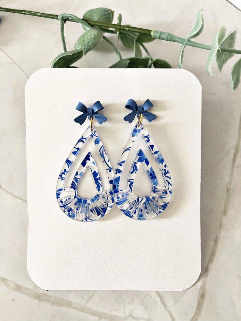 4182. Floral Teardrop Dangle Earrings: Blue Bow Accent