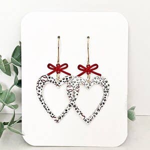 4181. Baseball Earrings: Acrylic Heart Dangles with Red Bow