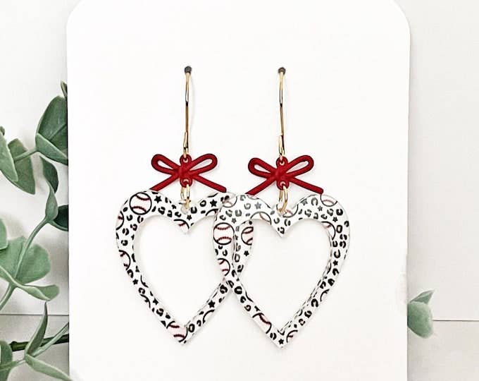 4181. Baseball Earrings: Acrylic Heart Dangles with Red Bow