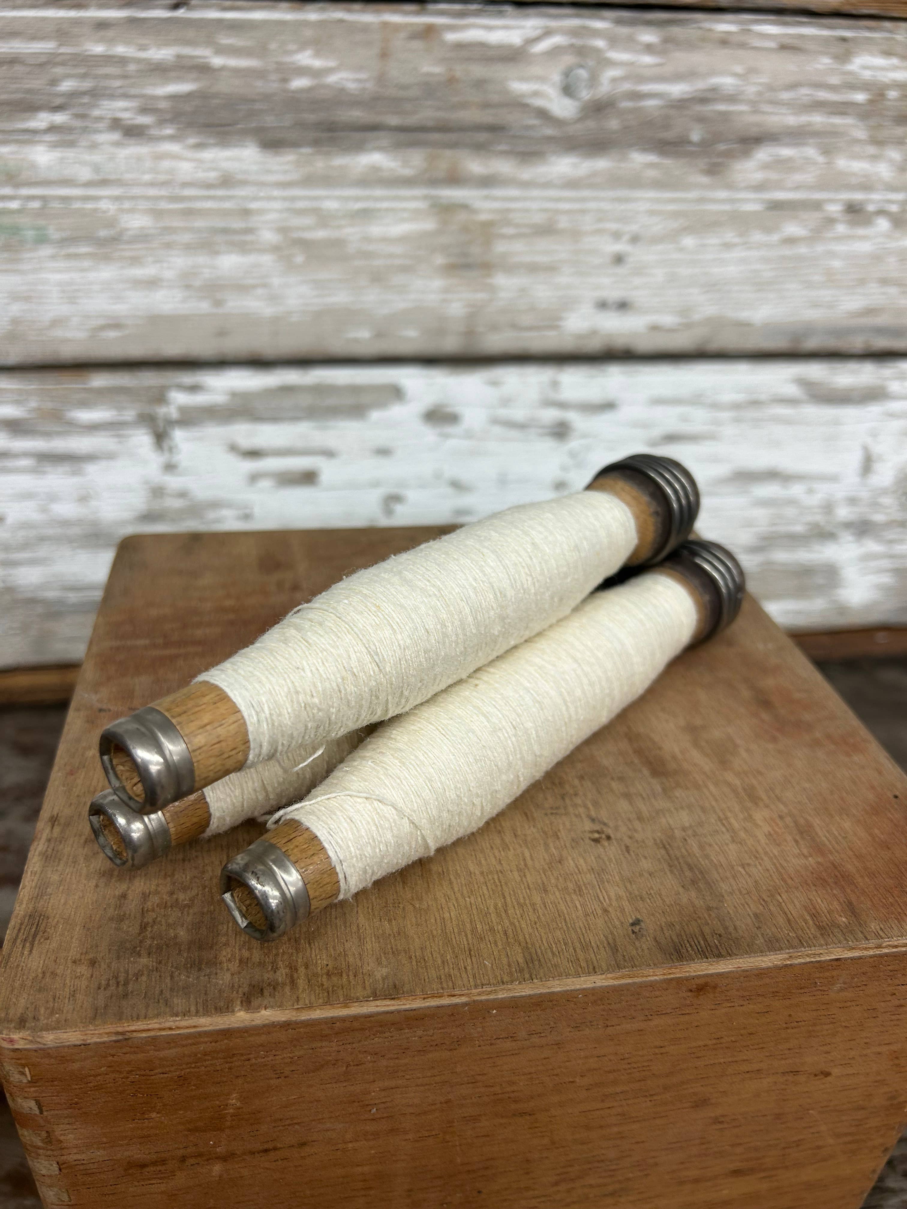 7005. Cream Yarn Quill